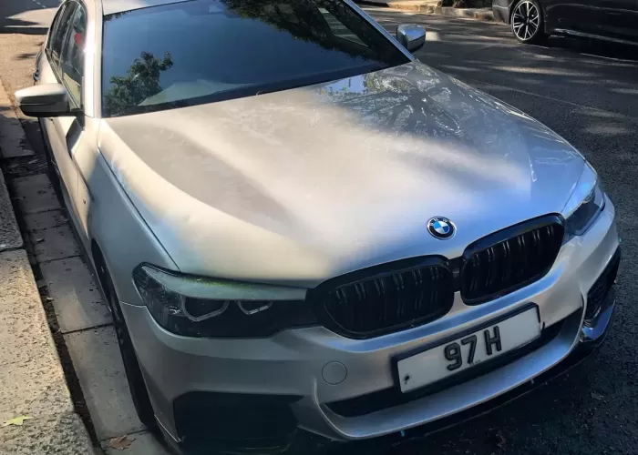 BMW with 97 H private number plate
